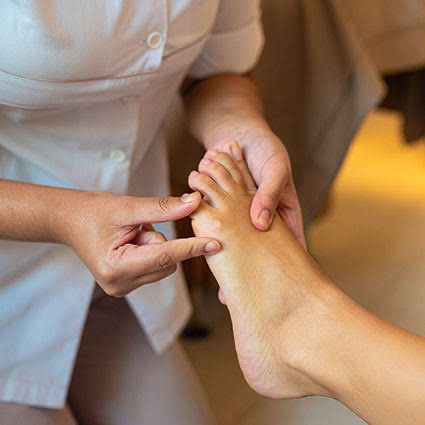 Massagem nos pés